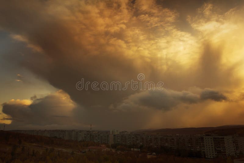 Heavy clouds under Murmansk stock photo