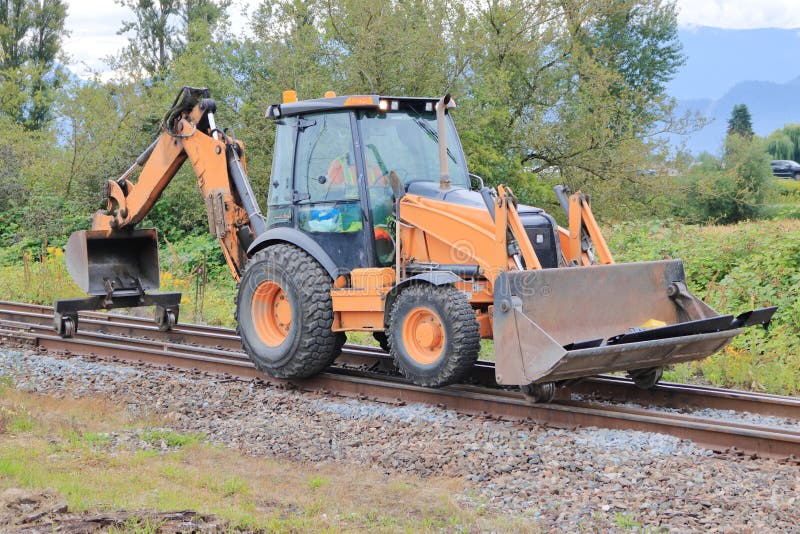 Heavy Construction Equipment on Rail Tracks Stock Photo Image of profile, excavation 153845596