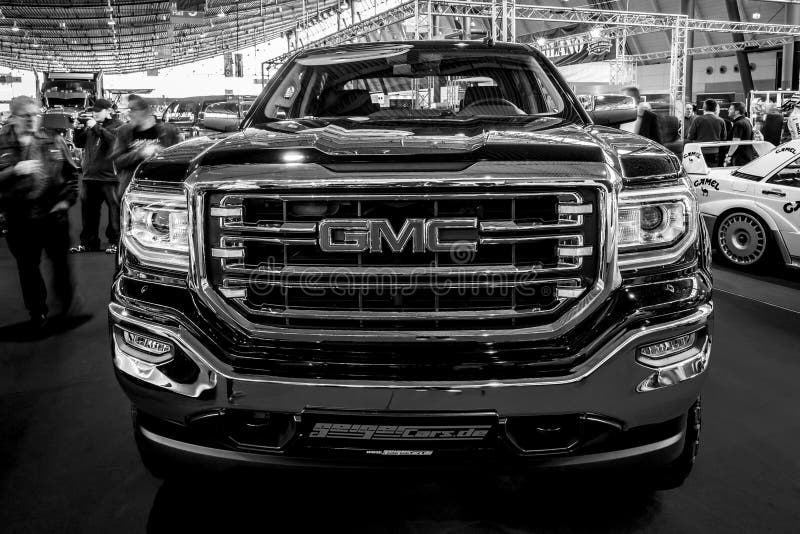 Heavy-Duty pickup truck GMC Sierra 1500 Crew Cab SLT, 2017. STUTTGART, GERMANY - MARCH 03, 2017: Heavy-Duty pickup truck GMC Sierra 1500 Crew Cab SLT, 2017 stock photo Heavy-Duty pickup truck GMC Sierra 1500 Crew Cab SLT, 2017. STUTTGART, GERMANY - MARCH 03, 2017: Heavy-Duty pickup truck GMC Sierra 1500 Crew Cab SLT, 2017 stock photo