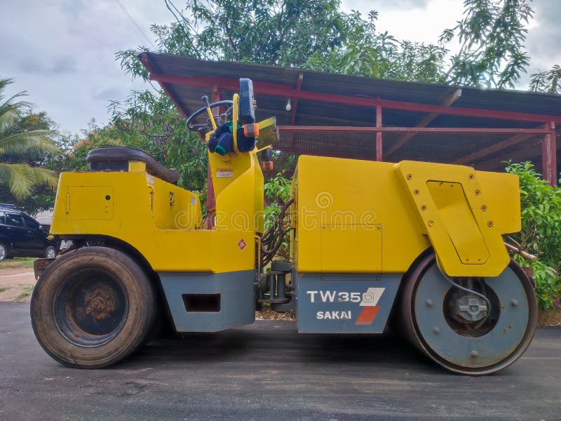 Heavy Equipment that Functions As a Compactor with a Combination Wheel