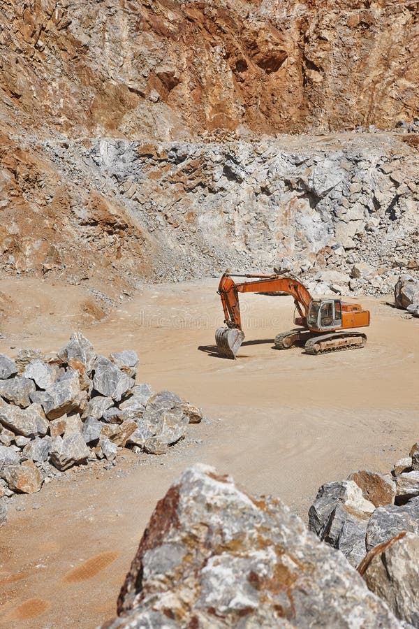 Heavy Excavator on a Quarry. Excavation Machinery. Earthmover Work