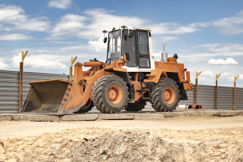 Heavy Front Loader or Bulldozer at the Construction Site. Construction