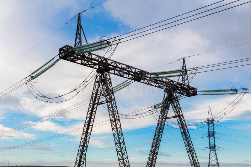 Heavy high voltage electric pylon and power transmission line.