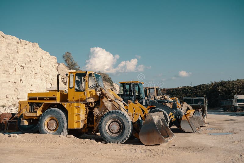 Heavy machinery in quarry stock photo. Image of gritty 159270124