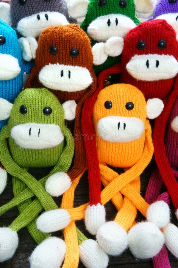 Amazing background of handmade product, group of homemade monkey with funny humorous in colorful, knitted monkeys make by knit from wool, woolen toy to happy new year 2016, so fun animal. Amazing background of handmade product, group of homemade monkey with funny humorous in colorful, knitted monkeys make by knit from wool, woolen toy to happy new year 2016, so fun animal