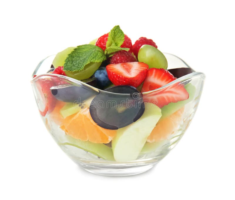 Heerlijke fruitsalade in glaskom op witte achtergrond royalty-vrije stock foto Heerlijke fruitsalade in glaskom op witte achtergrond royalty-vrije stock foto