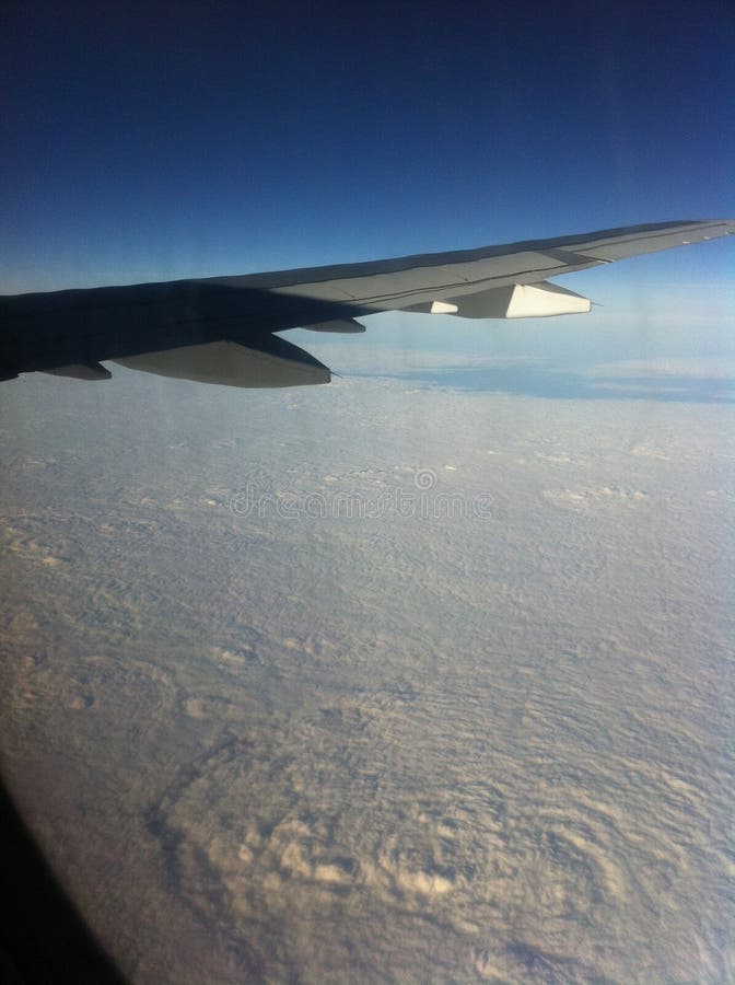 At the height of the airplane window. Airplane height stock images, royalty-free photos and pictures
