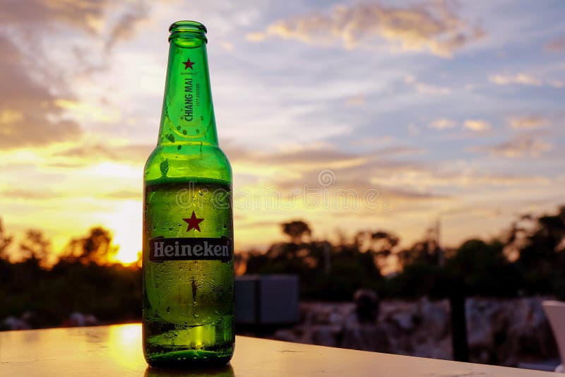 Heineken beer city edition on the table during sunset