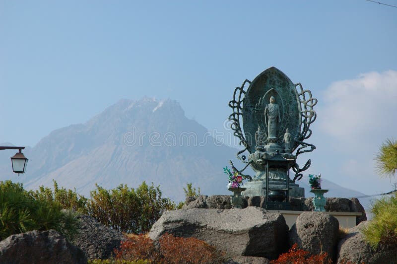 Heiseisinzan is a real, live volcano that spouts soot and ash every now and then. After the Volcano eruptions at the end of last centry there, the Heiseisinzan moutain created the topest peak in Japan. The Buddha sculpture in front of this moutain, is a kind of traditional asia's worship to the nature, trying to use the power of god to stop the imperilment of the nature. Heiseisinzan is a real, live volcano that spouts soot and ash every now and then. After the Volcano eruptions at the end of last centry there, the Heiseisinzan moutain created the topest peak in Japan. The Buddha sculpture in front of this moutain, is a kind of traditional asia's worship to the nature, trying to use the power of god to stop the imperilment of the nature.