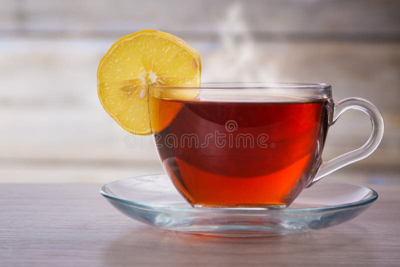 Heiße Tasse Tee und Zitrone stockfotos Heiße Tasse Tee und Zitrone stockfotos