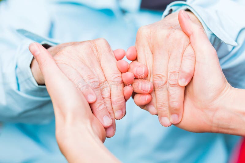 Young carer giving helping hands for the elderly woman. Young carer giving helping hands for the elderly woman