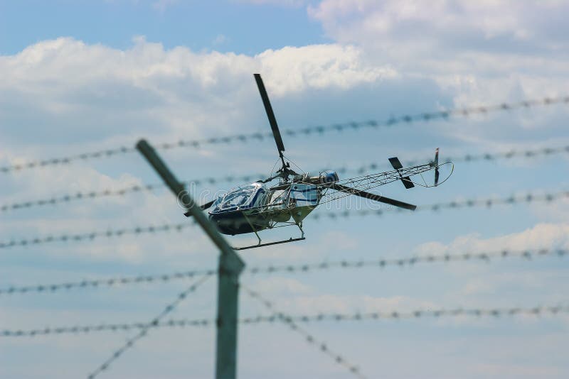 Helicopter Fly Near the Forest Stock Photo Image of military