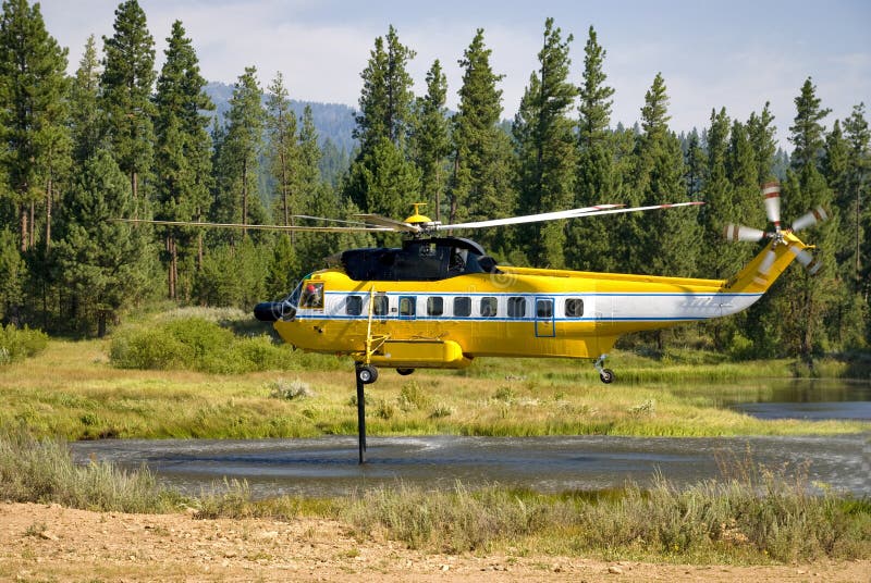 Helicopter Helping To Put Out Fires Stock Photo Image of pond, water