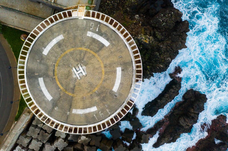 Helicopter Landing Pad on the Edge of the Cliff. Stock Photo Image of