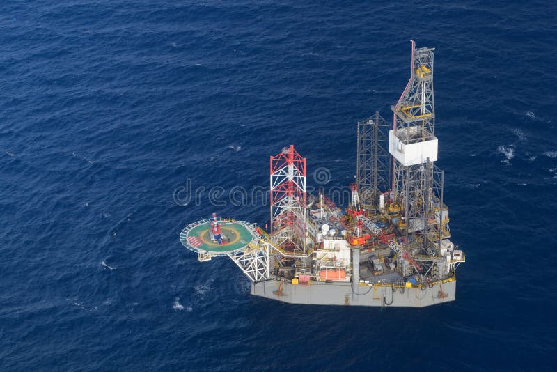 Helicopter pick up passenger on the offshore oil rig. royalty free stock photo Helicopter pick up passenger on the offshore oil rig. royalty free stock photo