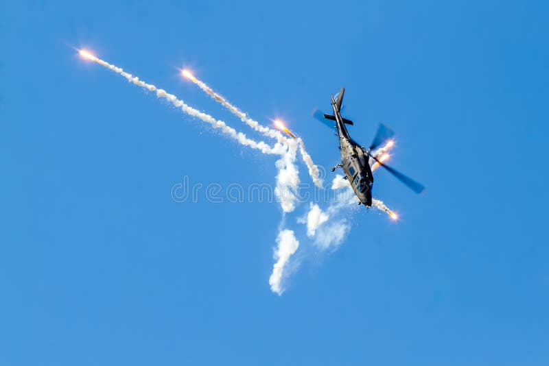 Helicopter releases flares on the airshow