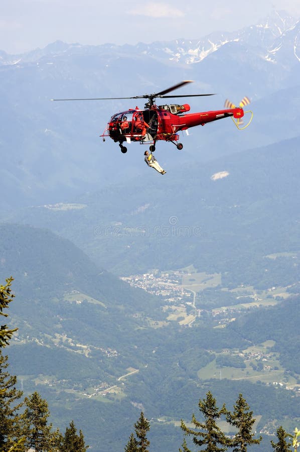 Helicopter rescuing stock photo. Image of france, cable 13644442