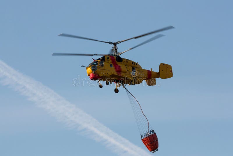 Helicopter with Waterbucket Editorial Photo Image of fire, heat 25662686