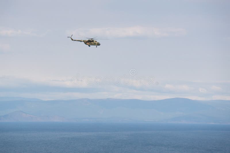 Download Helicóptero foto de stock. Imagem de povos, helicóptero - 65581394