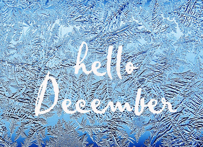 Hello December.Frosty natural pattern on winter window.Frost patterns on glass. stock images Hello December.Frosty natural pattern on winter window.Frost patterns on glass. stock images