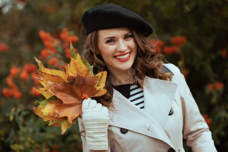 Portrait of Happy Elegant Woman in Beige Trench Coat and Beret Stock ...