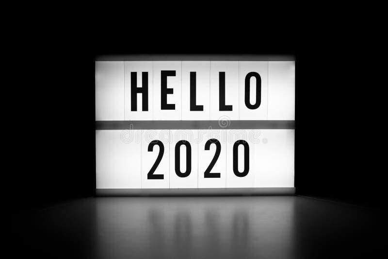 Hello 2020 - text on a display lightbox in the dark 新年概念 库存图片 Hello 2020 - text on a display lightbox in the dark 新年概念 库存图片