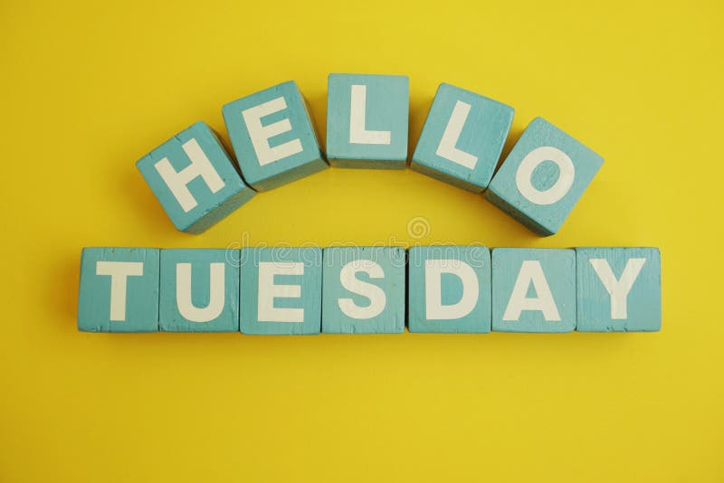 Hello Tuesday alphabet letters on yellow background.