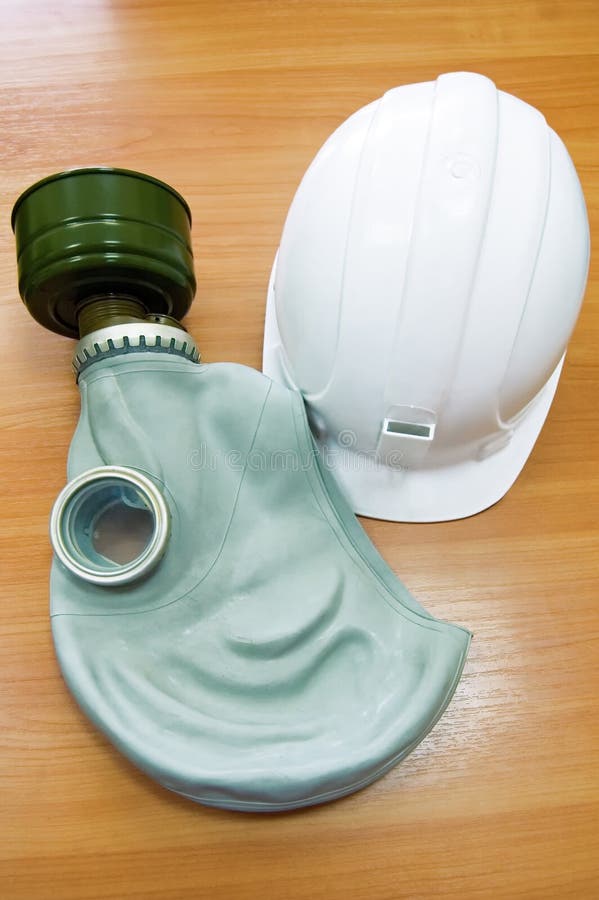 Helmet and mask stock image. Image of indoors, uniform 15843461