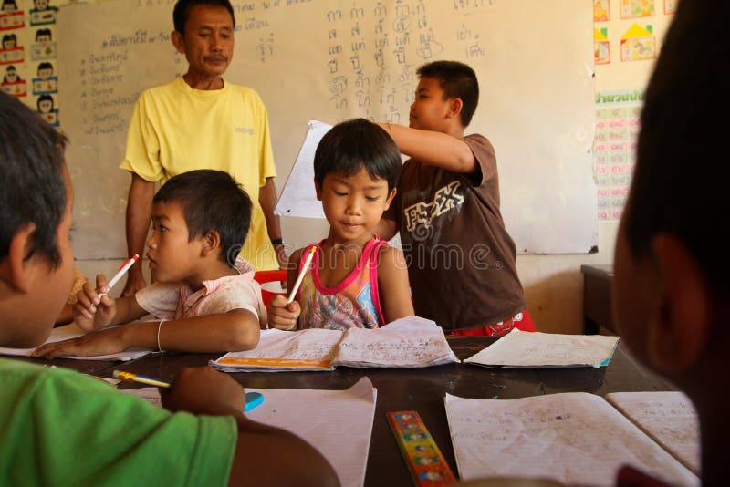 Help deprived children with education stock photography