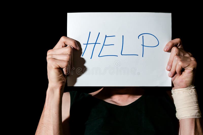 Help. Suicidal depression. Man holding help sign paper