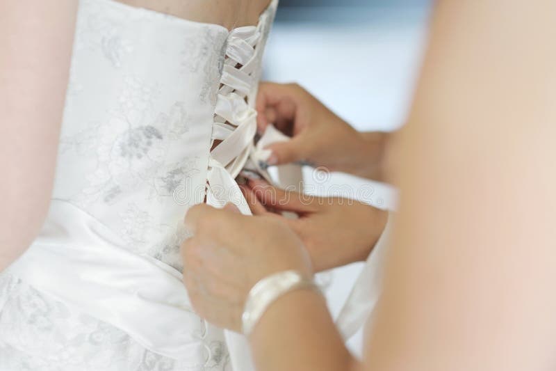 Helping the Bride To Put a Wedding Dress on Stock Image Image of help