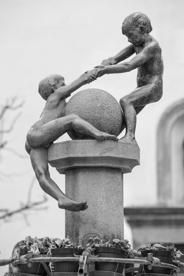 Helping. Children who help each other statue royalty free stock photography Helping. Children who help each other statue royalty free stock photography