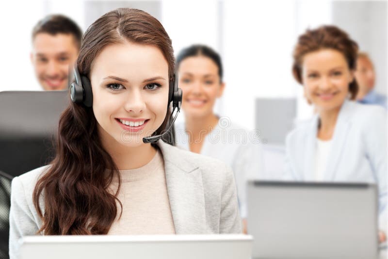 Helpline exploitant met hoofdtelefoons in call centre royalty-vrije stock afbeelding Helpline exploitant met hoofdtelefoons in call centre royalty-vrije stock afbeelding