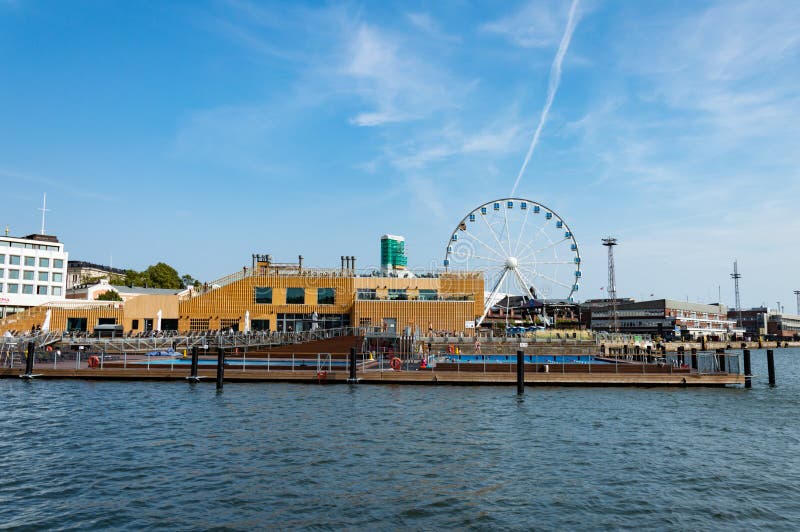 Helsinki Ferris Wheel and the open air pool royalty free stock image