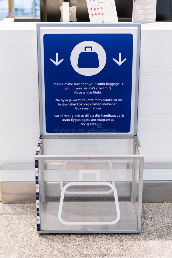 Helsinki, Finland - January 15, 2018: metallic carry on luggage sizer in airport