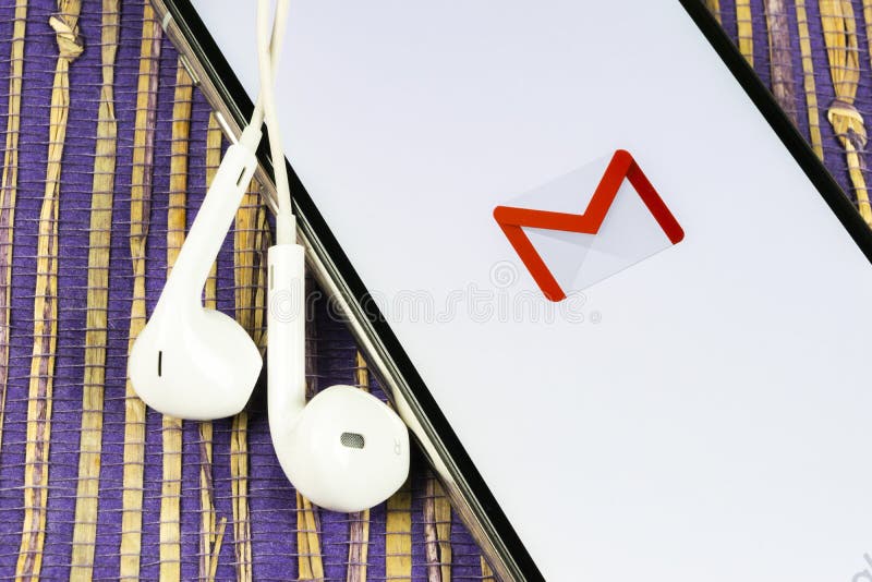Google Gmail application icon on Apple iPhone X smartphone screen close-up. Gmail app icon. Gmail is popular Internet online e-mai stock images