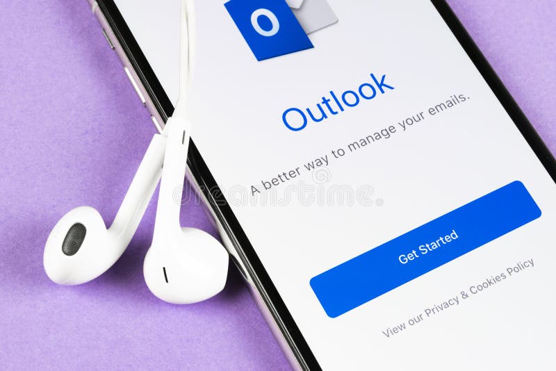Microsoft Outlook office application icon on Apple iPhone X screen close-up. Microsoft outlook app icon. Microsoft OutLook applica royalty free stock photography Microsoft Outlook office application icon on Apple iPhone X screen close-up. Microsoft outlook app icon. Microsoft OutLook applica royalty free stock photography