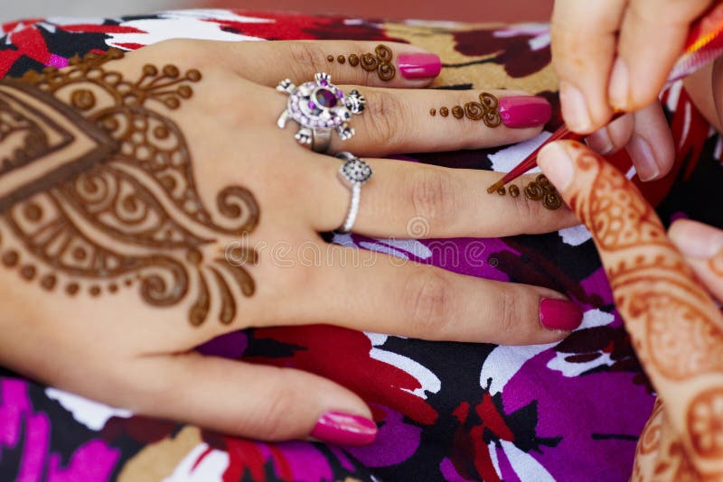 Henna art on woman's hand royalty free stock photos