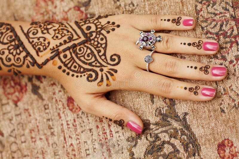 Heel veel goeds munt Woud Henna art on woman s hand stock photo. Image of beautiful - 26793778