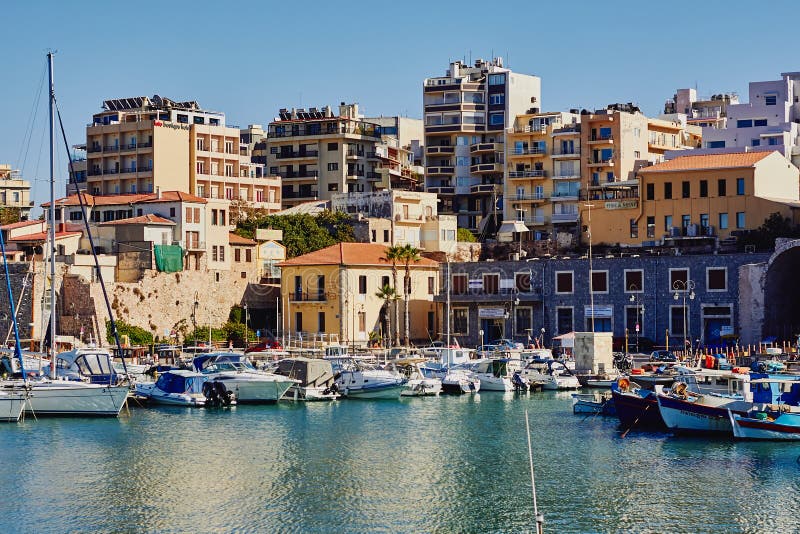 Heraklion, Crete, Greece, September 5, 2017: View of the old Venetian harbor, traditional architecture and boats stock photos Heraklion, Crete, Greece, September 5, 2017: View of the old Venetian harbor, traditional architecture and boats stock photos