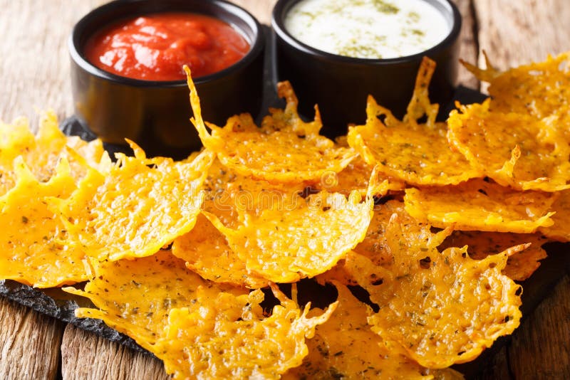 Herb Cheddar Chips Served with Sauces Close-up on a Board. Horizontal ...