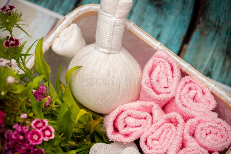 Spa herbal compresses with soap and facial towels