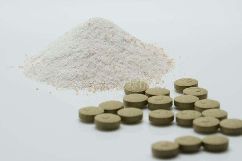 Herbal tablets and dry powders royalty free stock photo