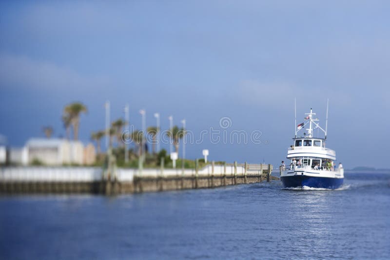 Ferry boat heading into port on Bald Head Island, North Carolina. Ferry boat heading into port on Bald Head Island, North Carolina.