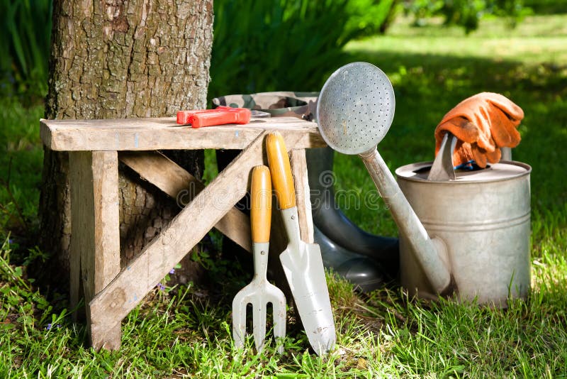 Gardening tools in the garden. landscaping. Gardening tools in the garden. landscaping.