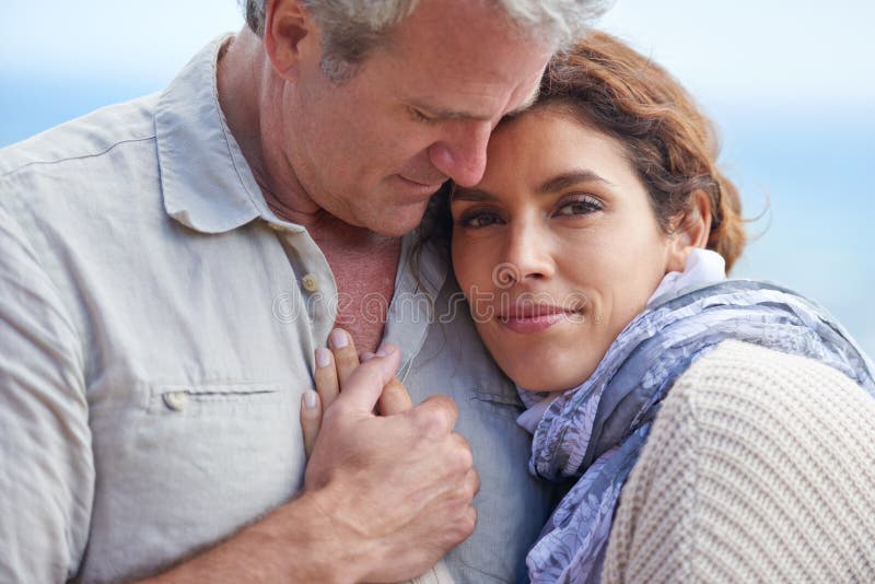 Hes The Love Of My Life Cropped Portrait Of Mature Woman Resting Her Head On Her Husbands Chest 