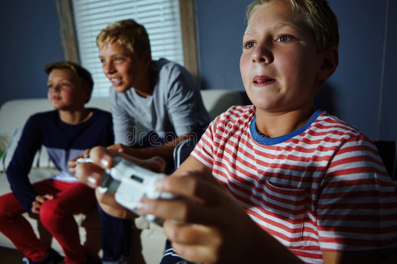 Kids Playing Video Games Tv Stock Photos Free & RoyaltyFree Stock