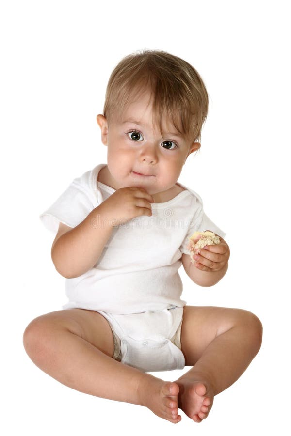 Het aanbiddelijke Eten van de Jongen van de Baby stock afbeeldingen Het aanbiddelijke Eten van de Jongen van de Baby stock afbeeldingen
