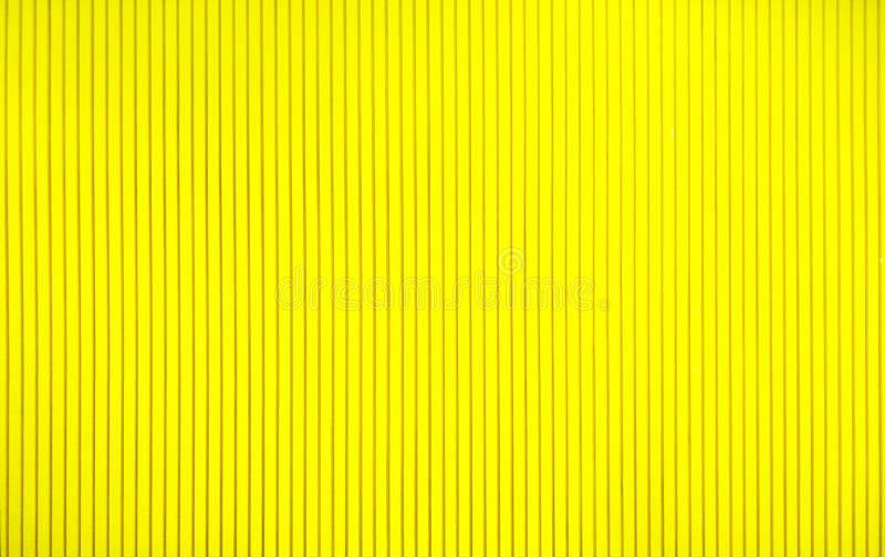 Het abstracte concept als achtergrond, sluit omhoog mooie textuur gele muur en eenvoudig ontwerp van rechte lijn voor binnenlands stock afbeeldingen Het abstracte concept als achtergrond, sluit omhoog mooie textuur gele muur en eenvoudig ontwerp van rechte lijn voor binnenlands stock afbeeldingen