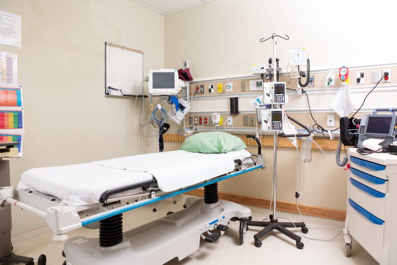 Het Bed van het noodsituatieziekenhuis met Materiaal stock afbeeldingen Het Bed van het noodsituatieziekenhuis met Materiaal stock afbeeldingen